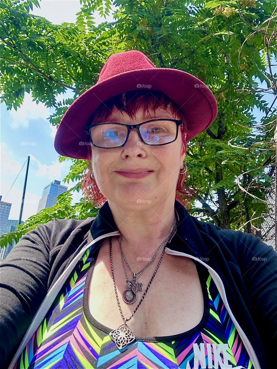 This is me, “Petra Schiller” a.k.a. “Maxine Firefox” a.k.a. “Maximiliane Feuerfuchs” standing in the parking lot beneath the “Pulaski Bridge” at “Newtown Creek” in LIC, Queens on a sunny summertime afternoon in August 2024. Hypnotic Productions