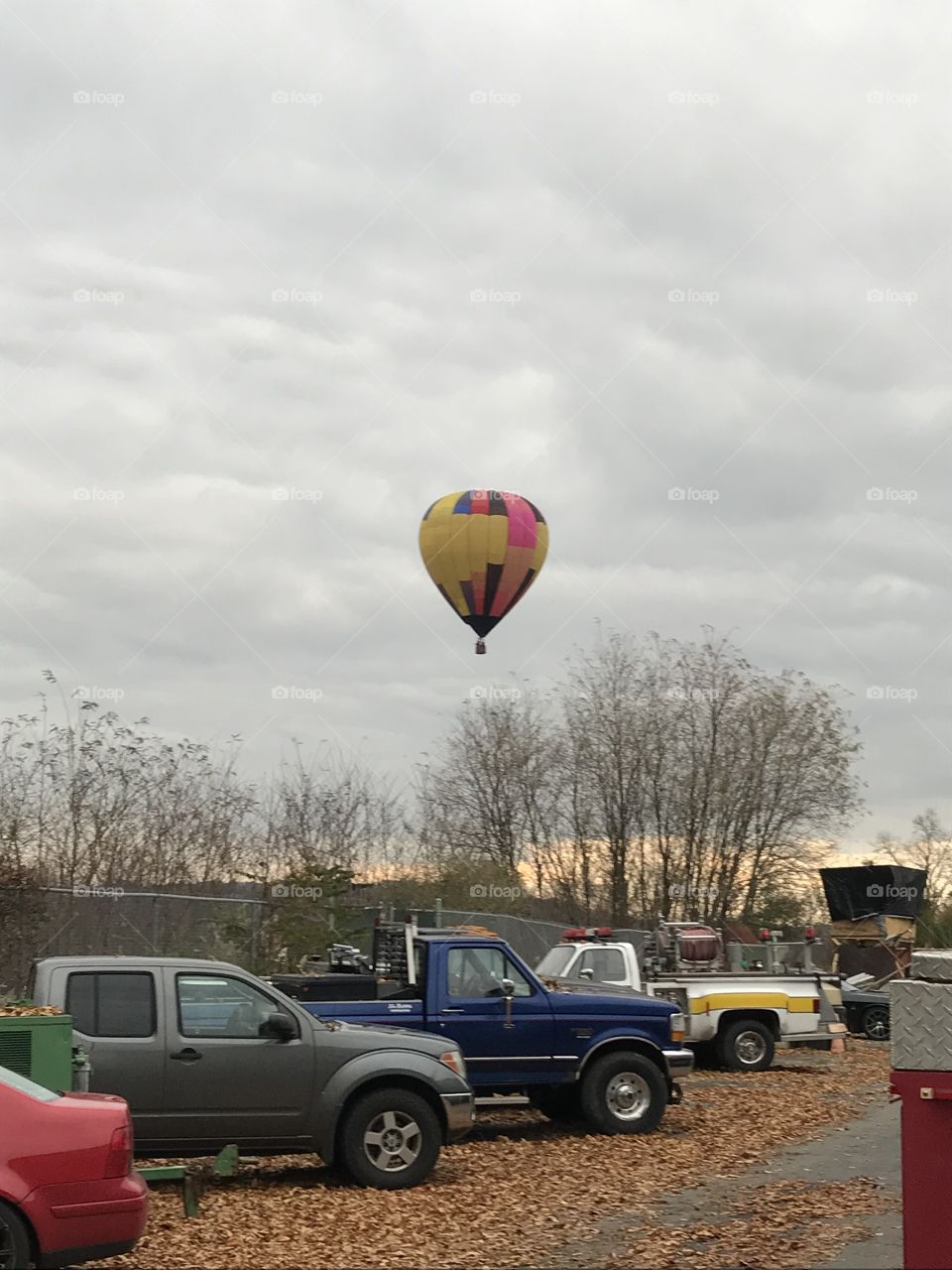 Hot air ballon almost landing at out shop. 