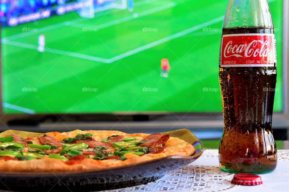 Enjoying football with Coca Cola!