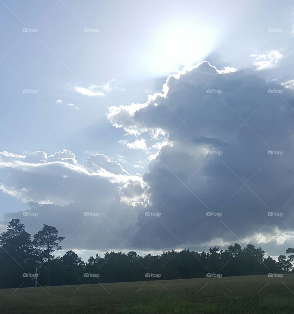 Sun Rays And Clouds