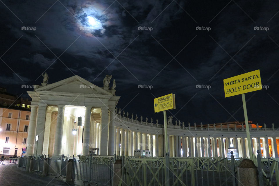 Rome Vatican June 2016. St. Peters crowd night entrance with sign to holy door.  Porta Santa only opens during a Jubilee year for the pilgrims to pass.