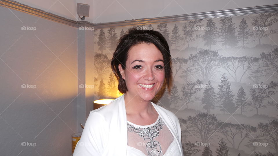 formally dressed smiling woman