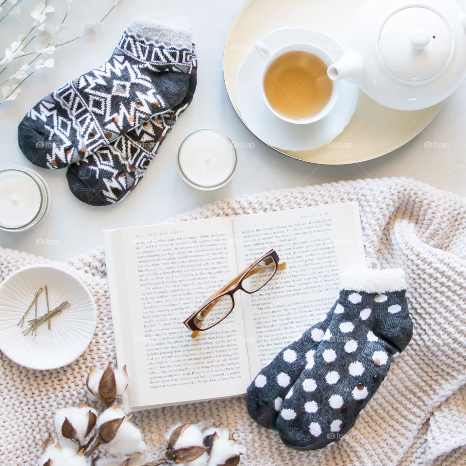 Cozy flatlay with socks and tea