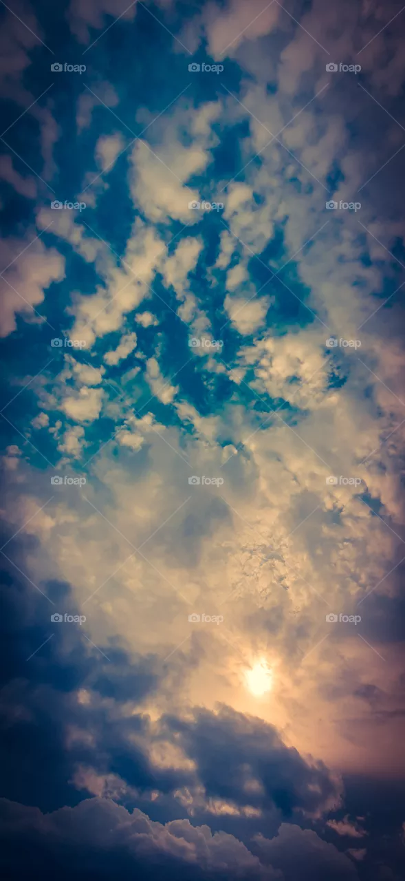 "Clouds come floating into my life, no longer to carry rain or usher storm, but to add color to my sunset sky".
-Rabindranath Tagore.