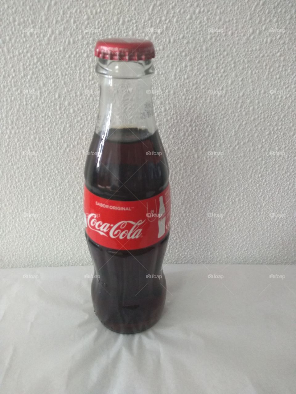 refresca tu vida con Coca cola.