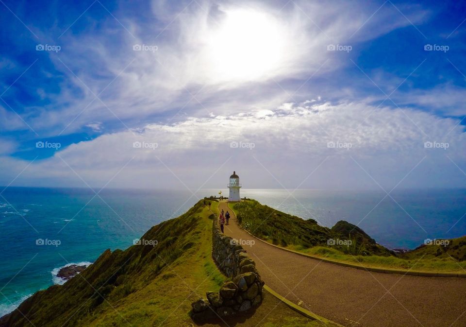 Lighthouse at Cape Reinga. Where the Tasman sea meets the Pacific Ocean, the most northerly point of New Zealand