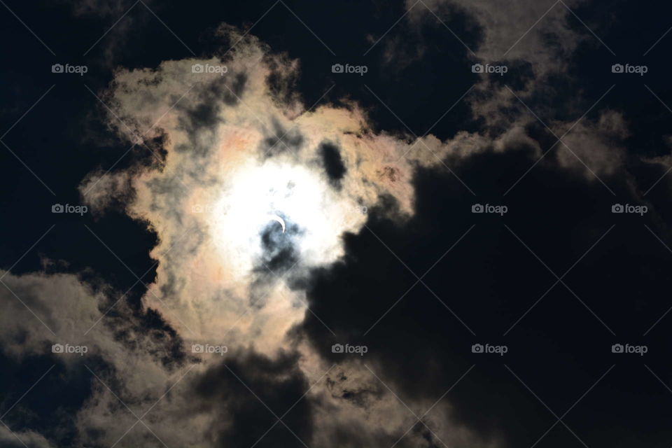 Solar Eclipse with Clouds