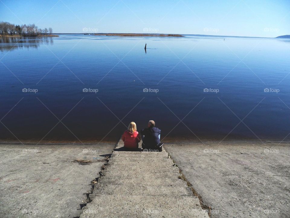 two are sitting on the banks of the Dnieper River