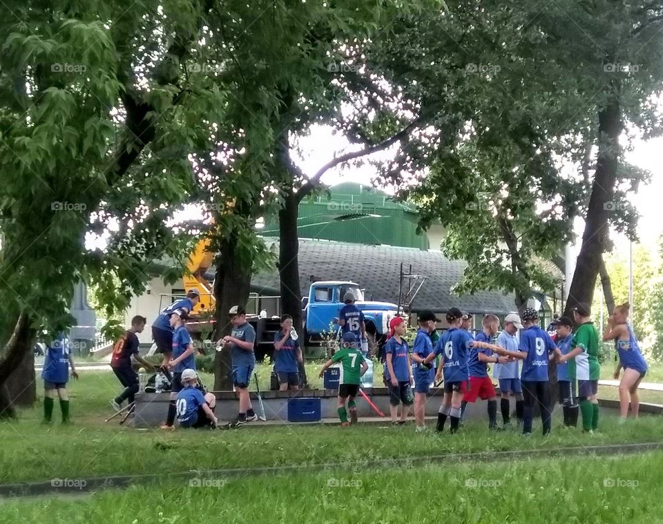 children sport time in the city park training