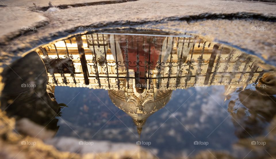 Bagan/Myanmar-Unseen shot of The most famous Pagoda in Bagan , Shwezigon Pagoda reflect in the small puddle that tourist should not forget to visit