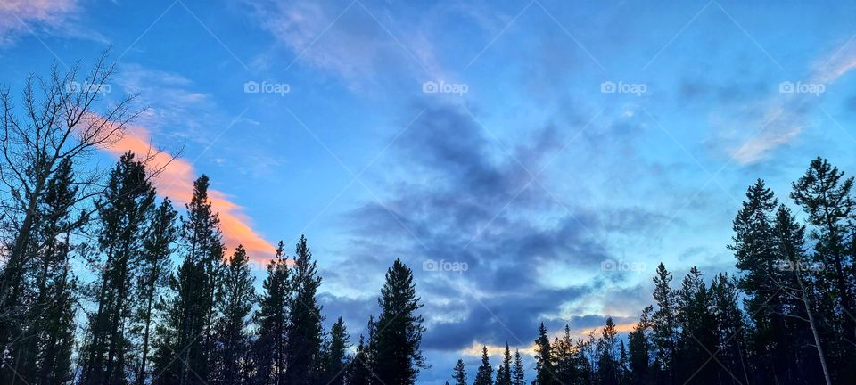 Sunset clouds illuminated in the north sky