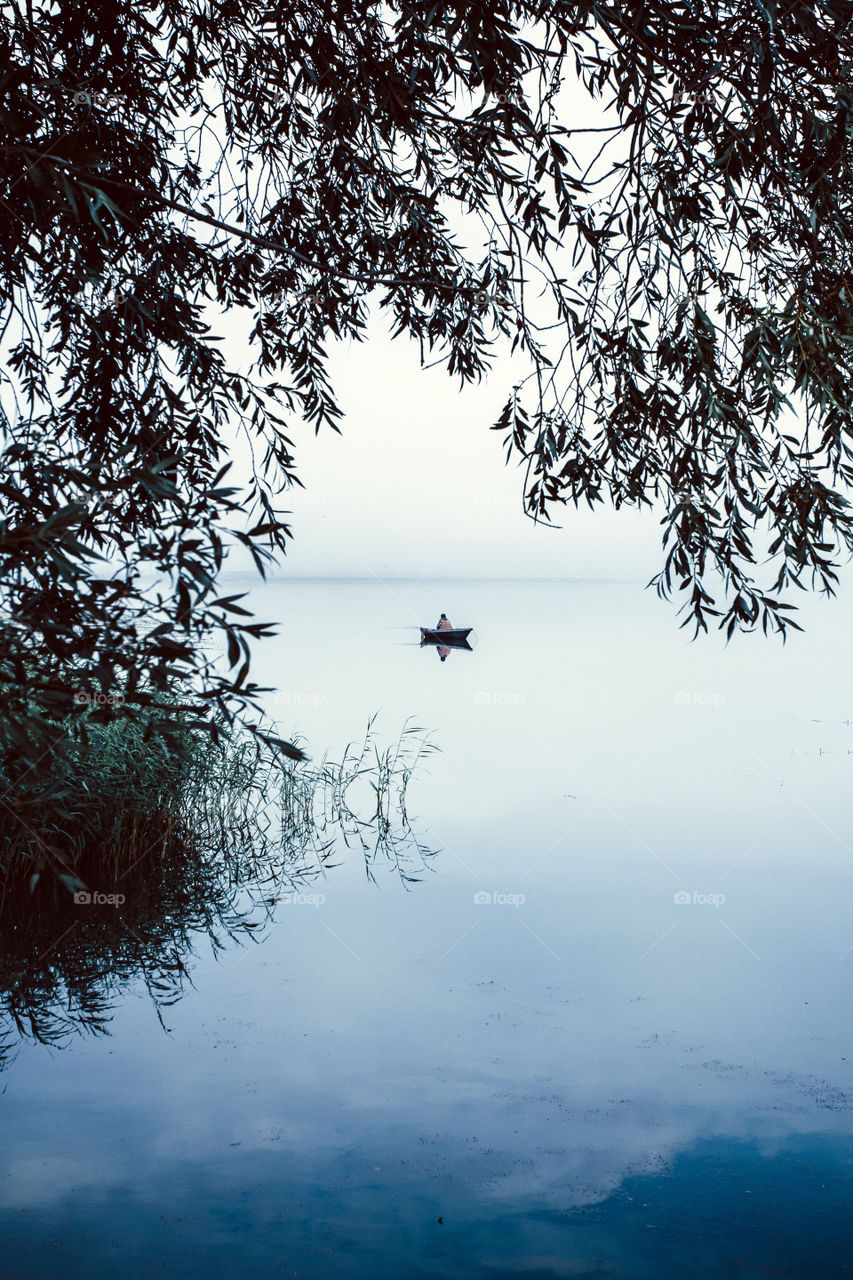 Fisherman on the lake