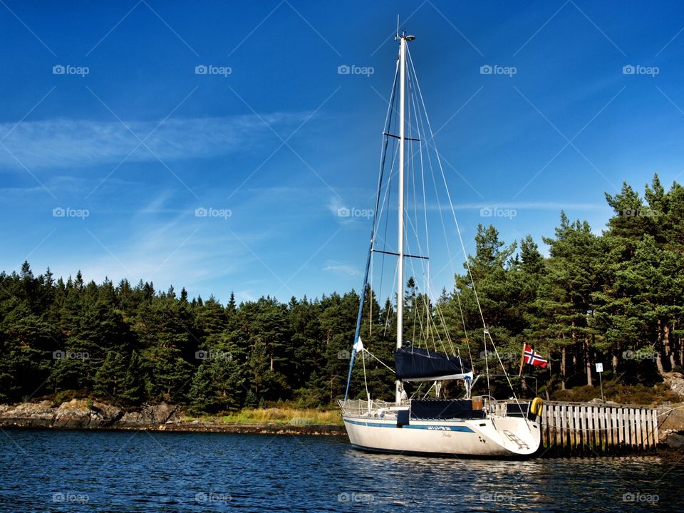 Sailboat at pier