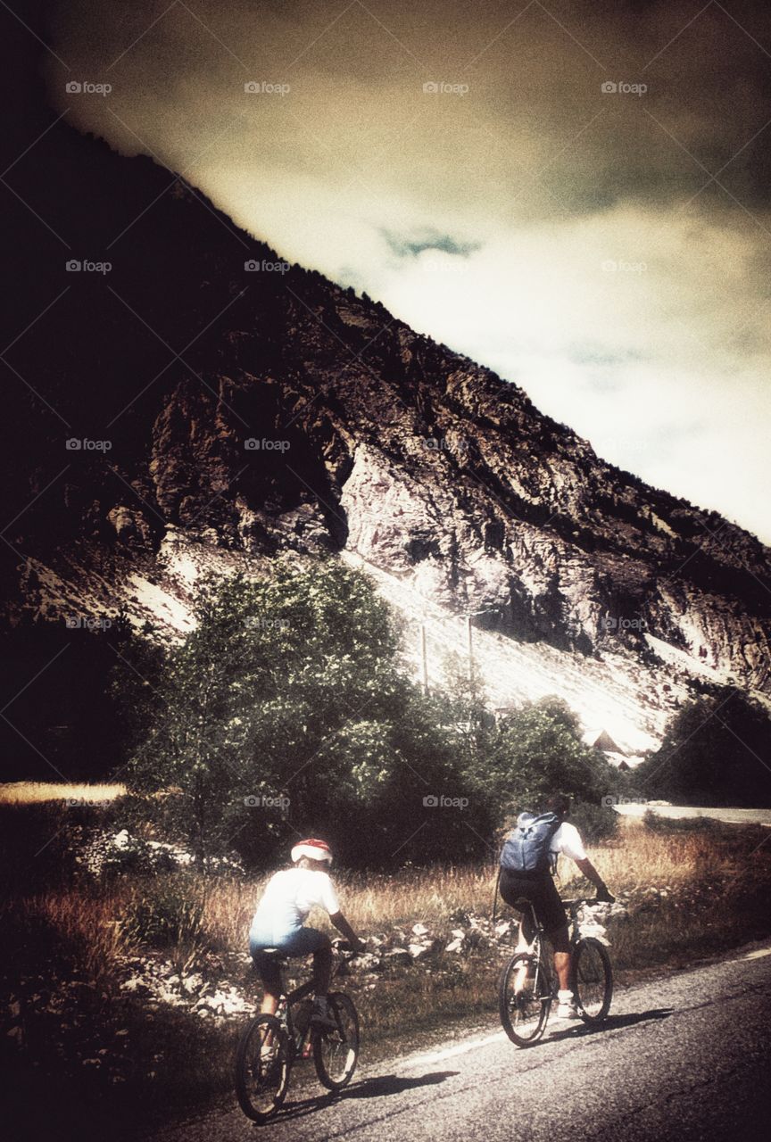 Cyclists. Alps