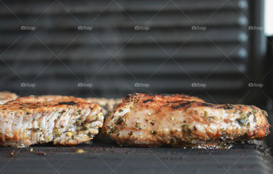 Cooking food on grill