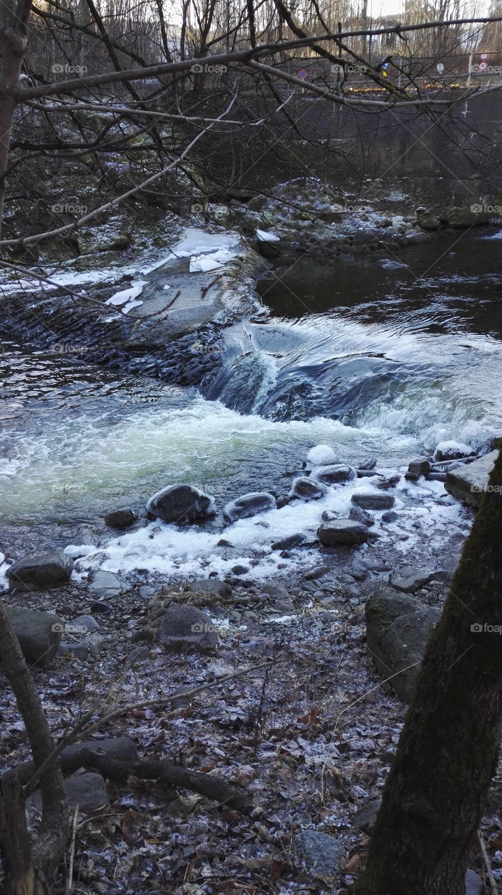 water stream  with snow and ice