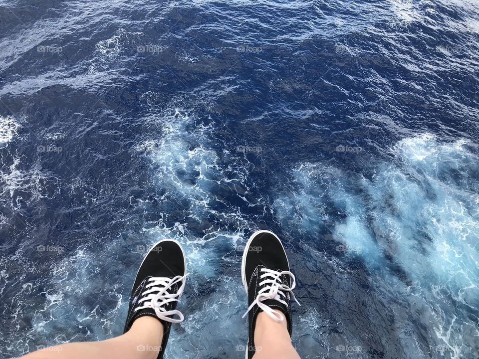 Feet over the ocean. 