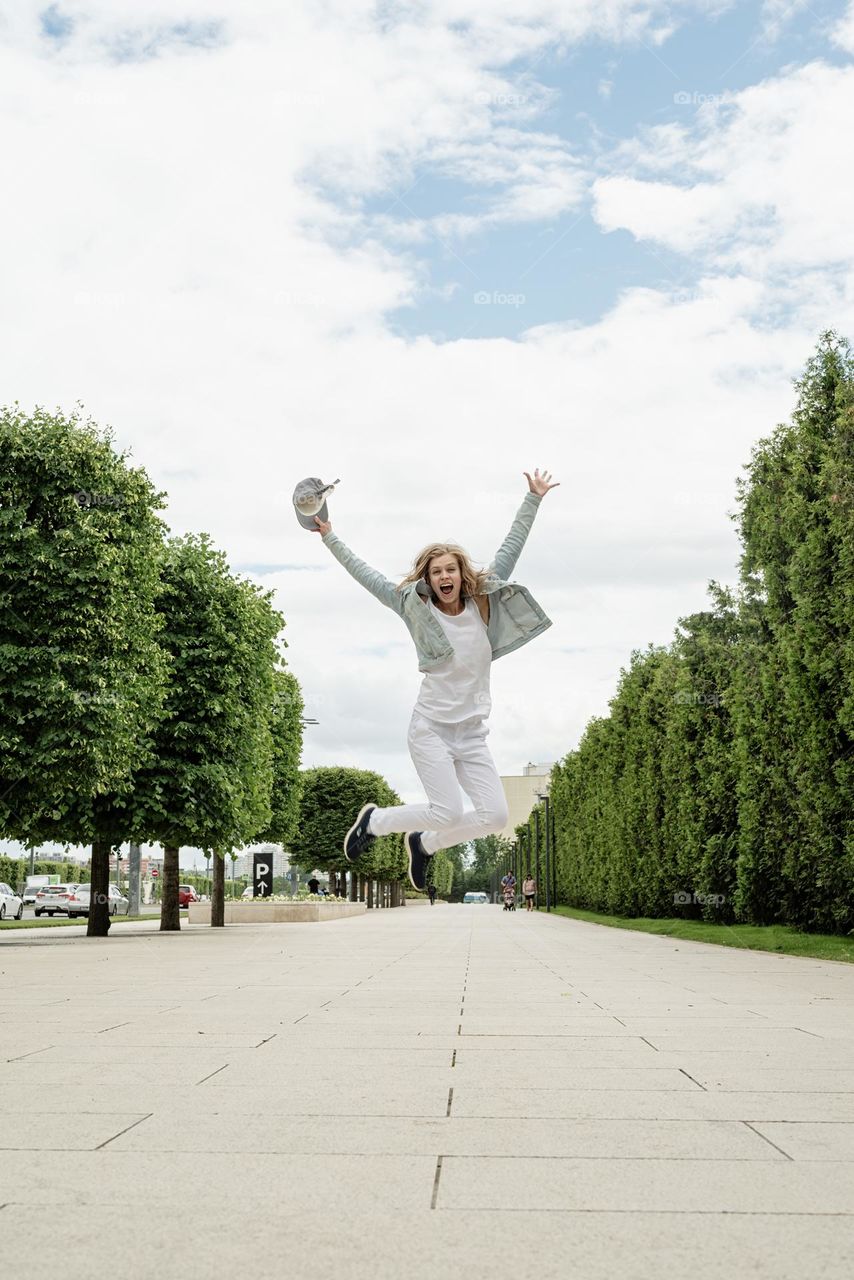 woman jumping outdoor