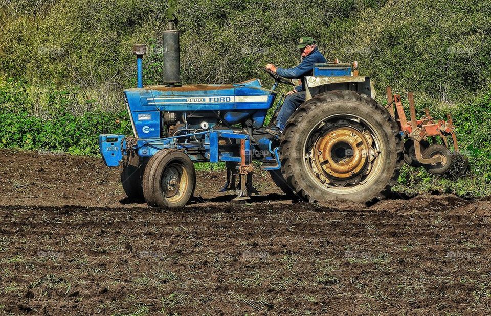 Farmer on a Tractor