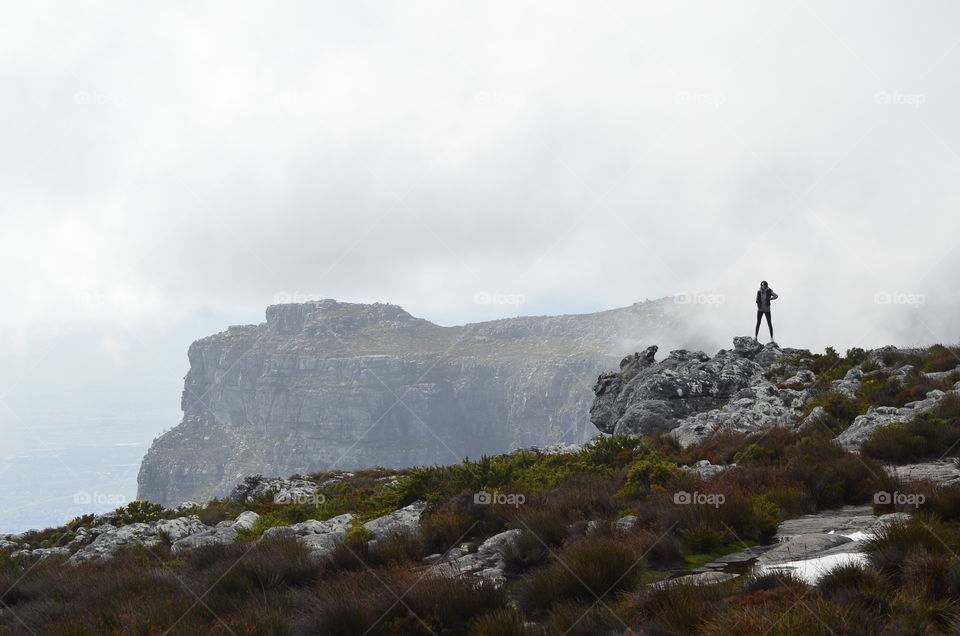 Tourist looking at mountains