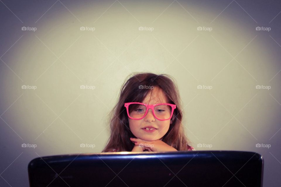 Child working on a laptop