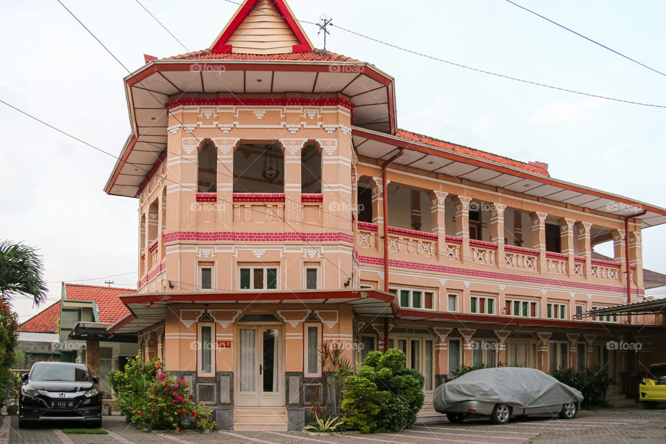 A building with Dutch architecture in the middle of town