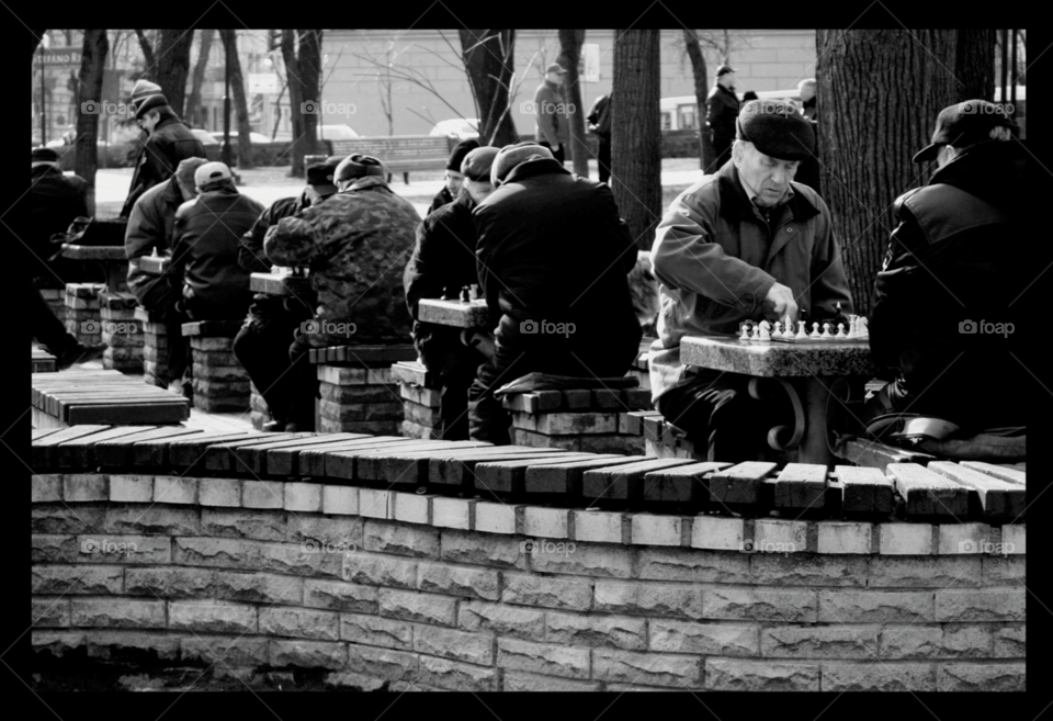 chesd. men playing chess at a park in Kiev.