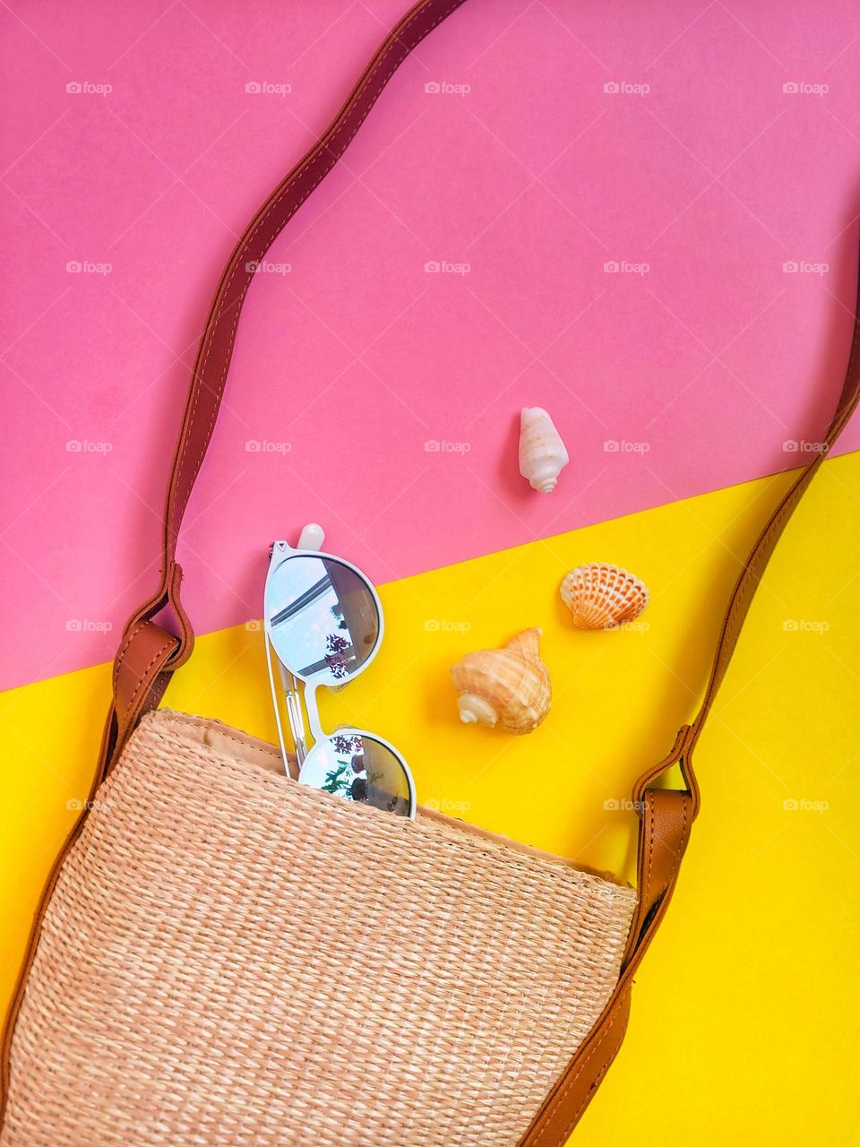 Summer bag, sunglasses and seashells