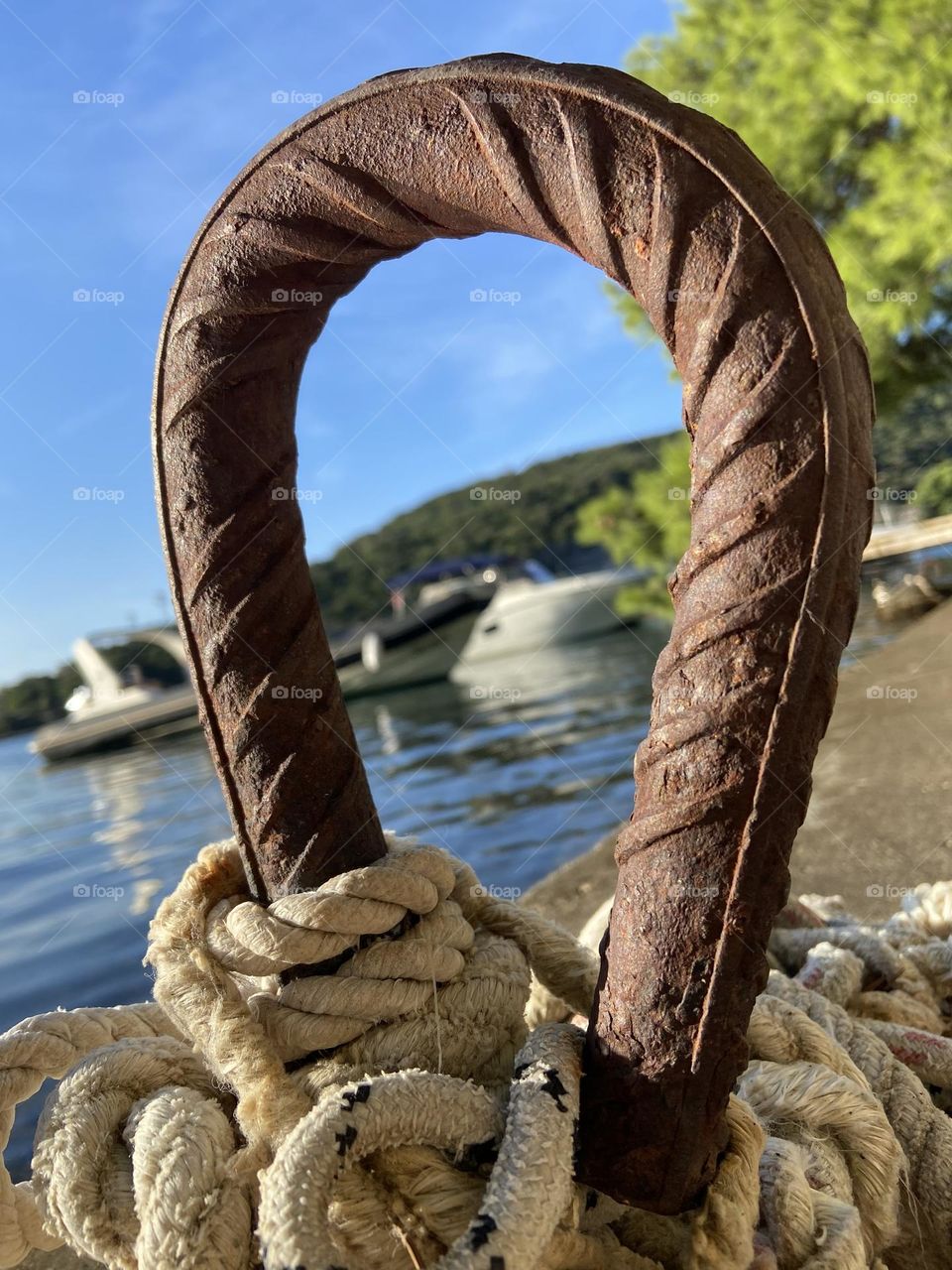 Tying ropes near the sea.