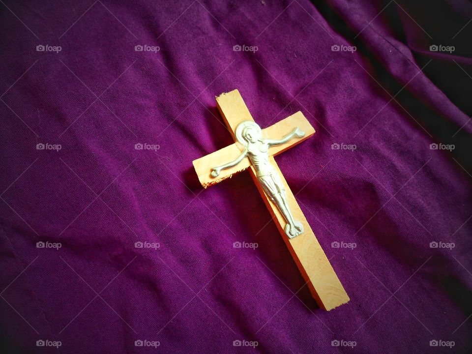 orthodox cross on purple background