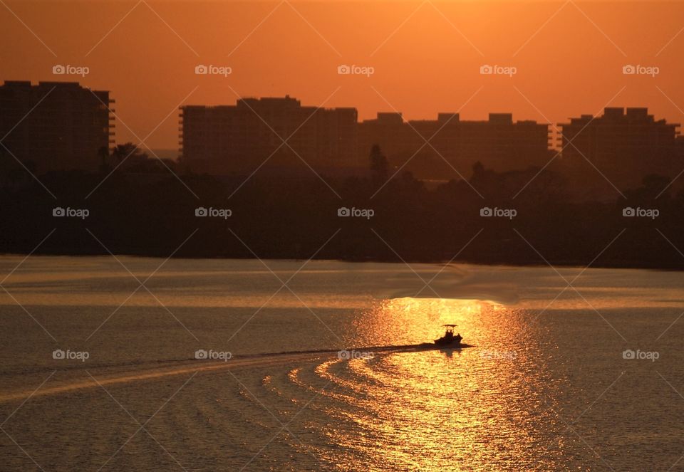 Boating fun in the sun. Golden sunset 