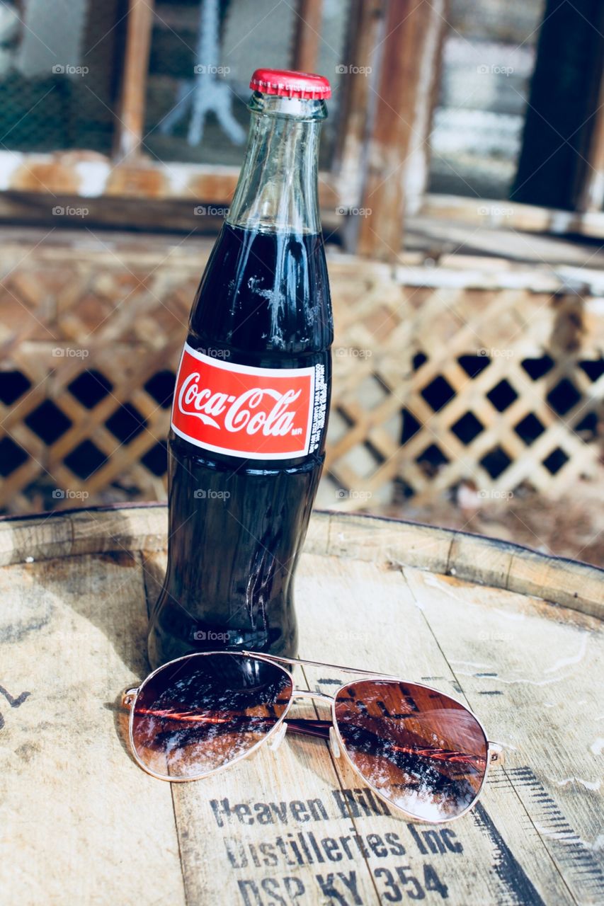 Coke and aviators 