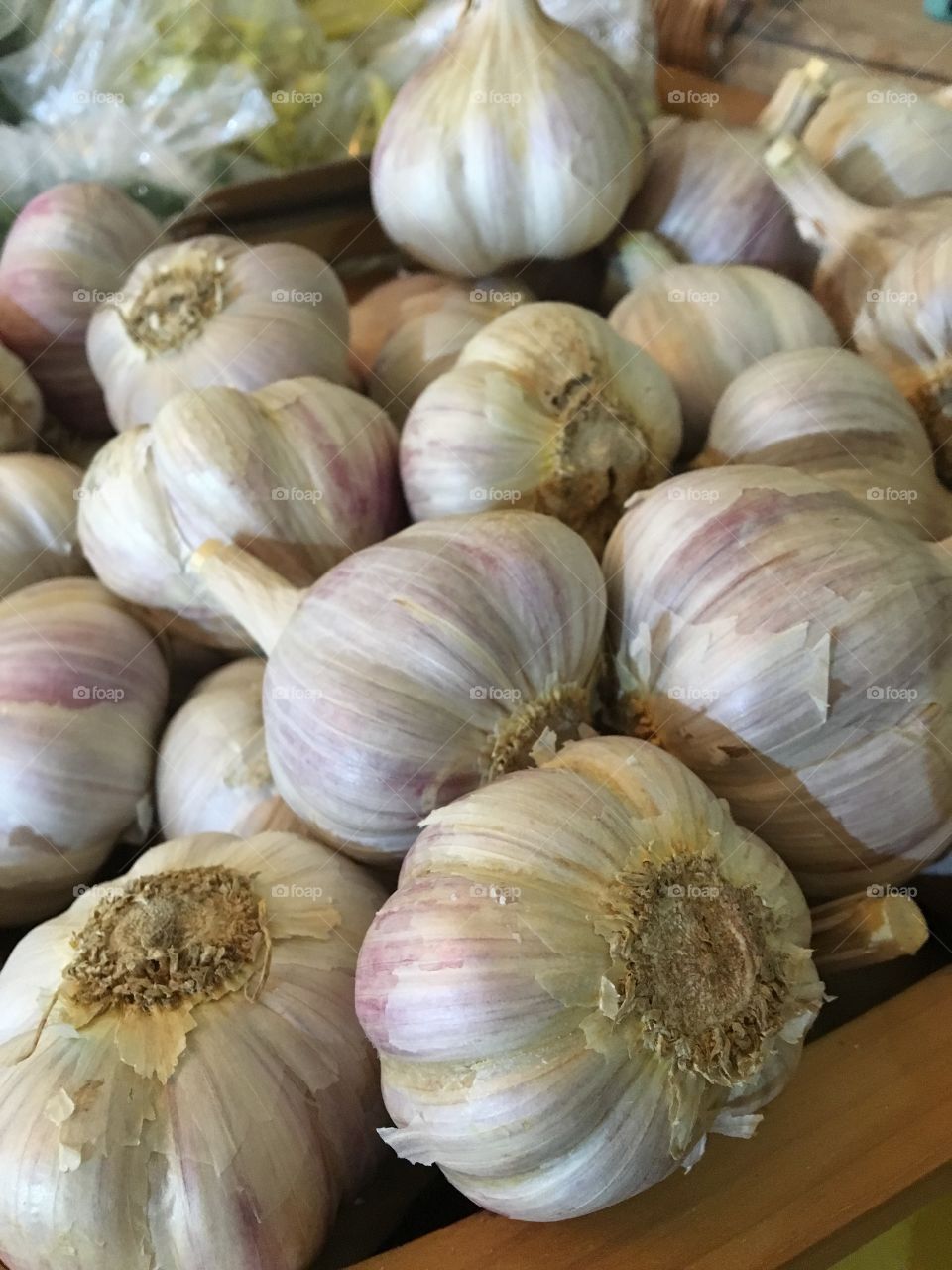 Beautiful, fragrant and freshly harvested organic garlic draws customers in at a small Farm Store in the Niagara Region