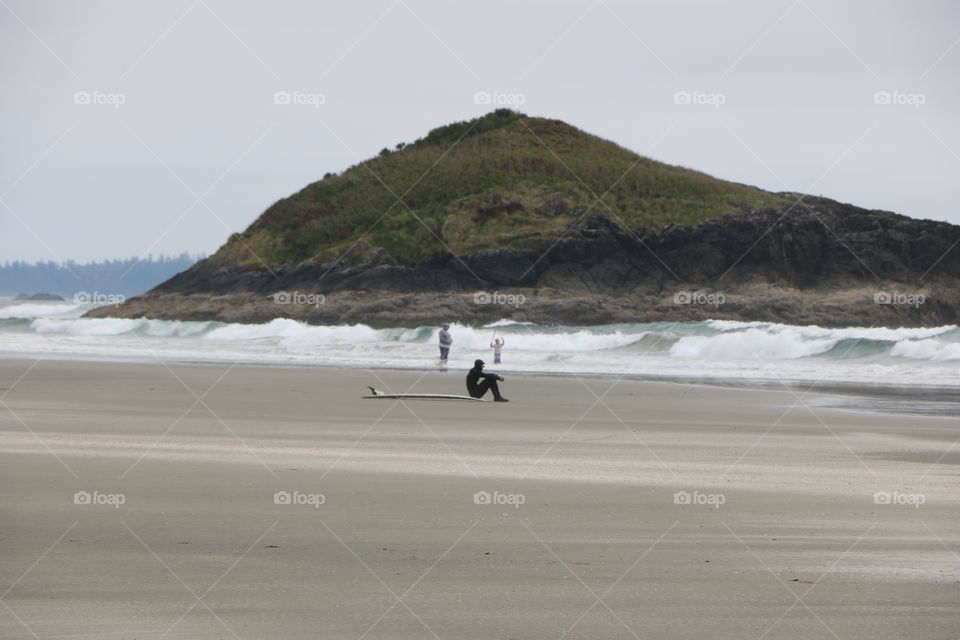 Long Beach , Tofino , British Columbia - wide sandy beach where ocean is wild and waves are perfect for surfers.. Incarceration Rock right in the middle of the photo reach with marine life easy to be seen when the tide is low -starfish, mollusks ...