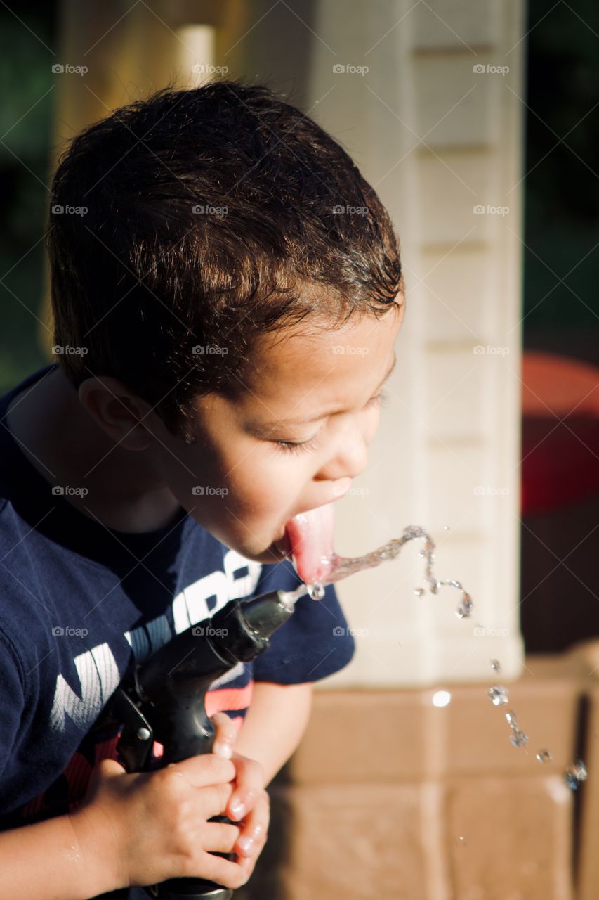 Refreshing sip of water on a hot day