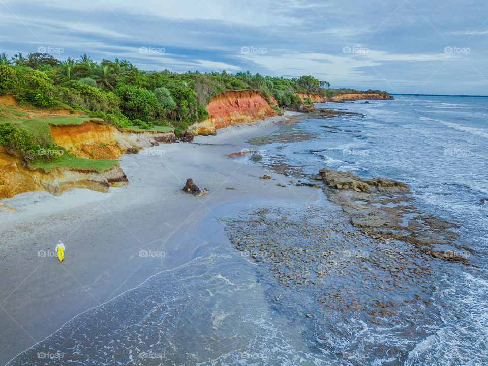 enjoy the white sand of the beach during the day