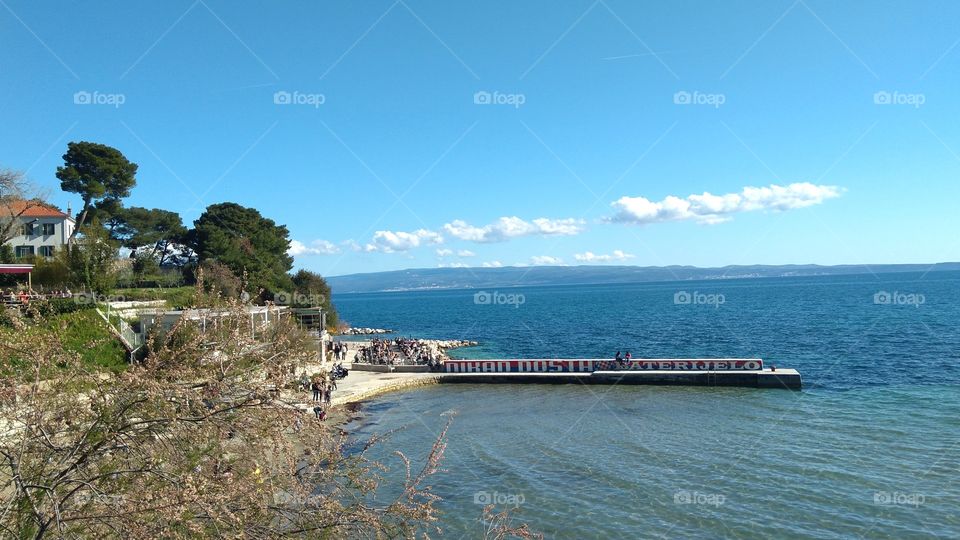 Enjoying the Spring Day by the Sea