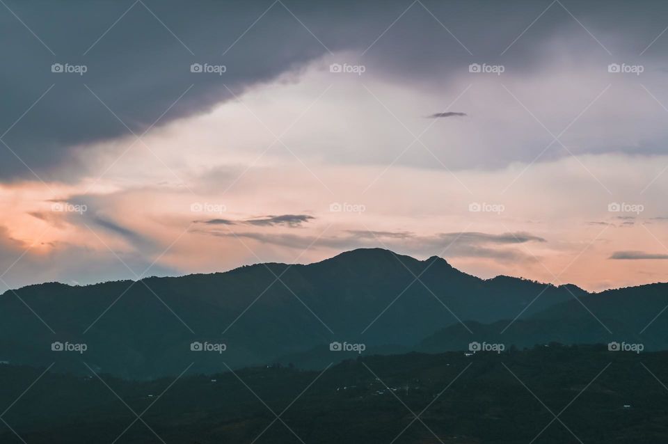 Weather playing games over the mountains