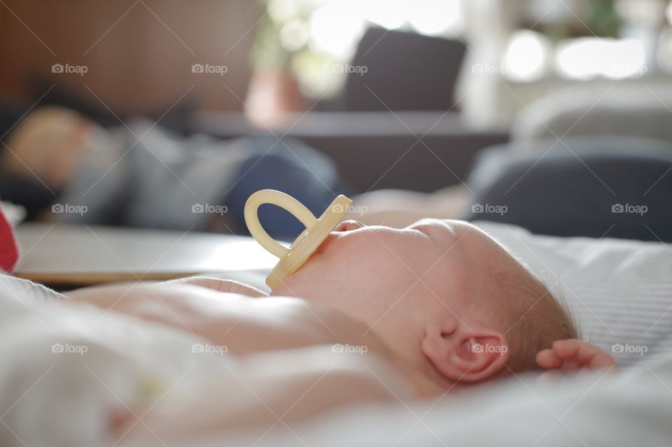 Sleeping baby with pacifier