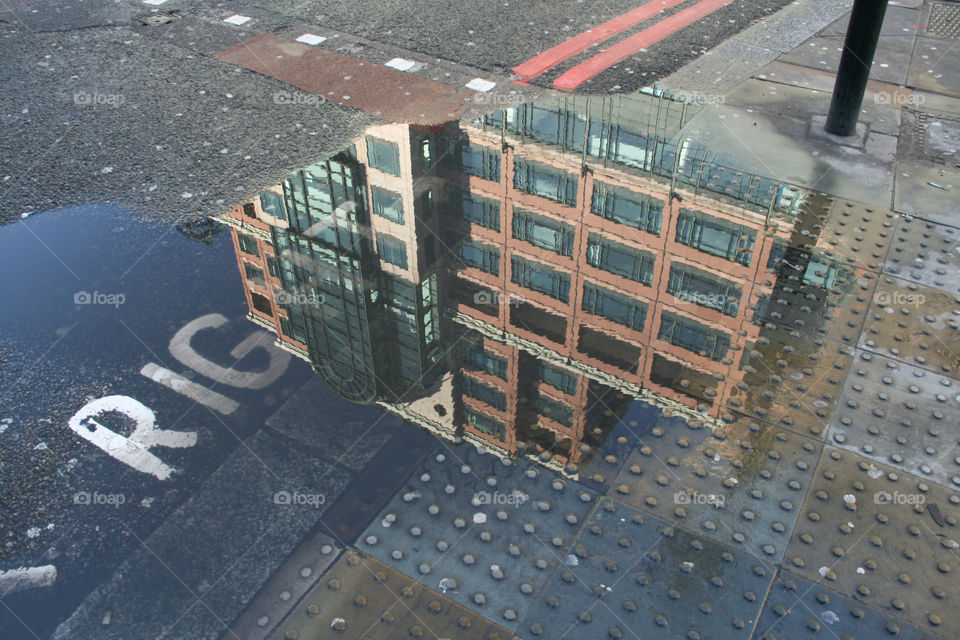 Reflection in a puddle, London