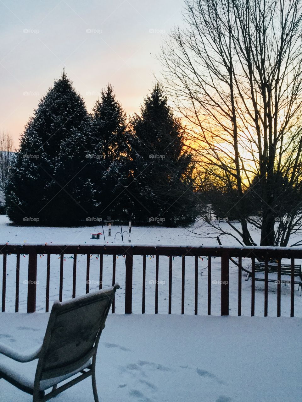 A beautiful sunset with the fresh snow on the ground. 