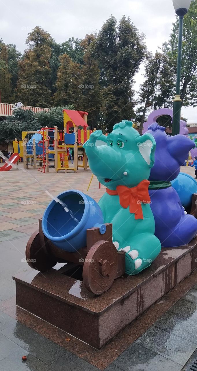 Elephants on the playground.