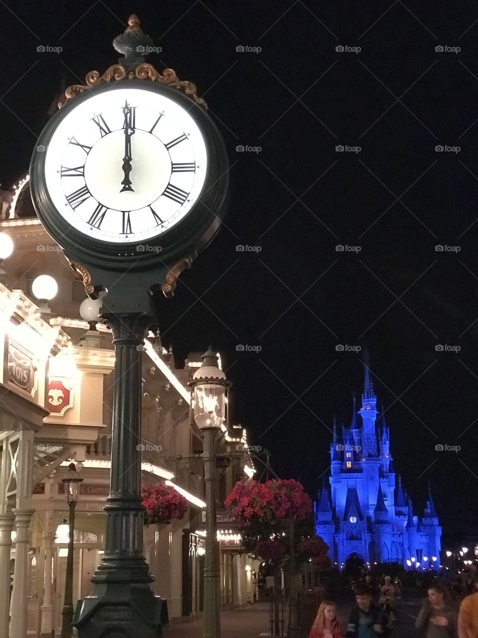 Clock strikes midnight in the Magic Kingdom