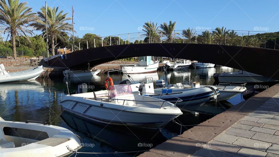 Boats in Porto Pino, south Sardinia, Italy