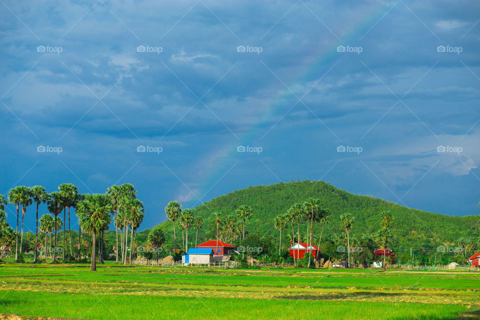 Rainbow come to the mountain . I shoot this picture around 5:00 pm in the evening after the raining.