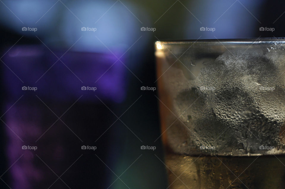 lemonade with ice in a misted glass