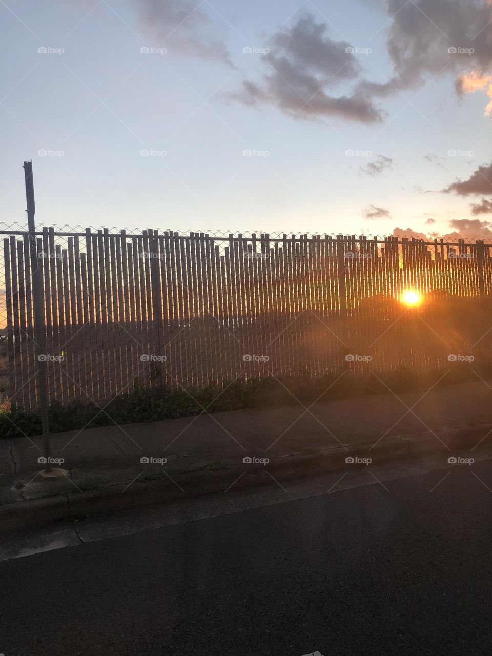 Fences and sunsets