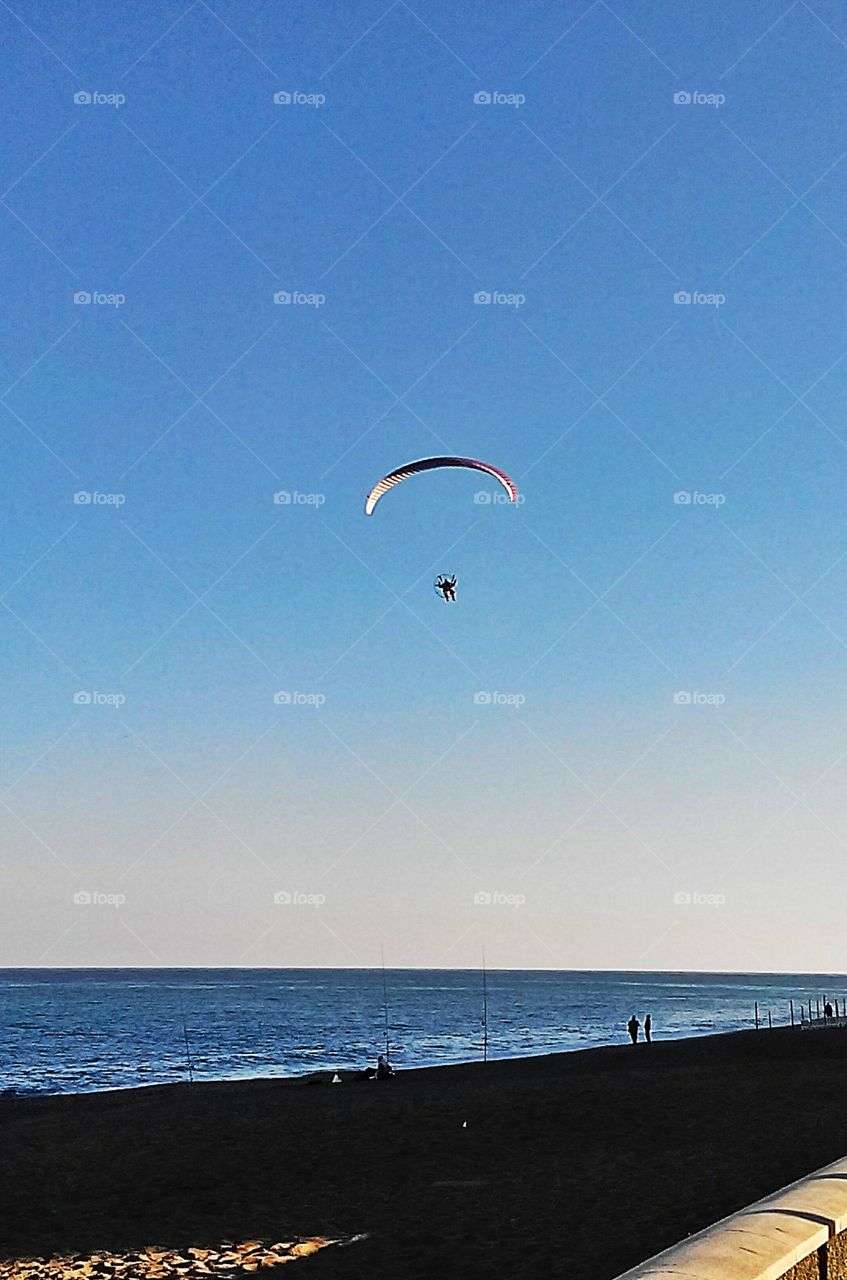 Sightseeing tour by paraglide . Paragliding at Costa del Sol beaches
