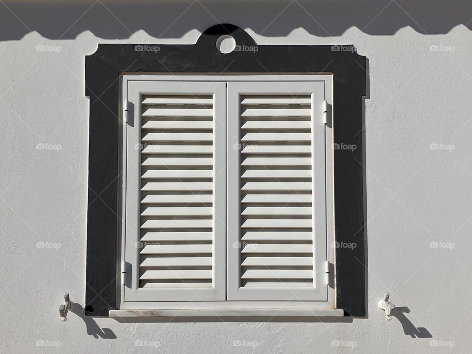 White and grey shutter