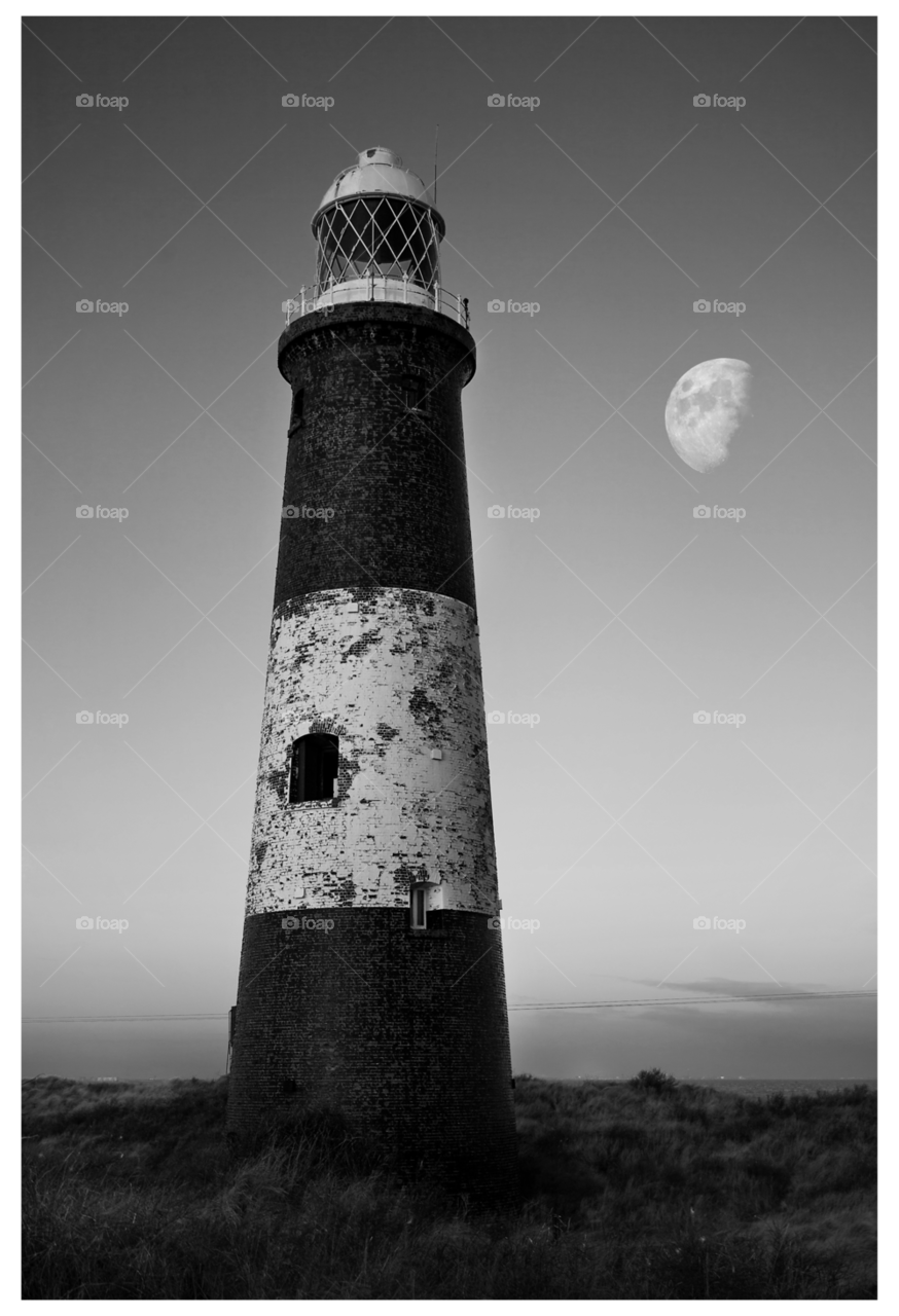 spurn point lighthouse dawn moon by Weathers71